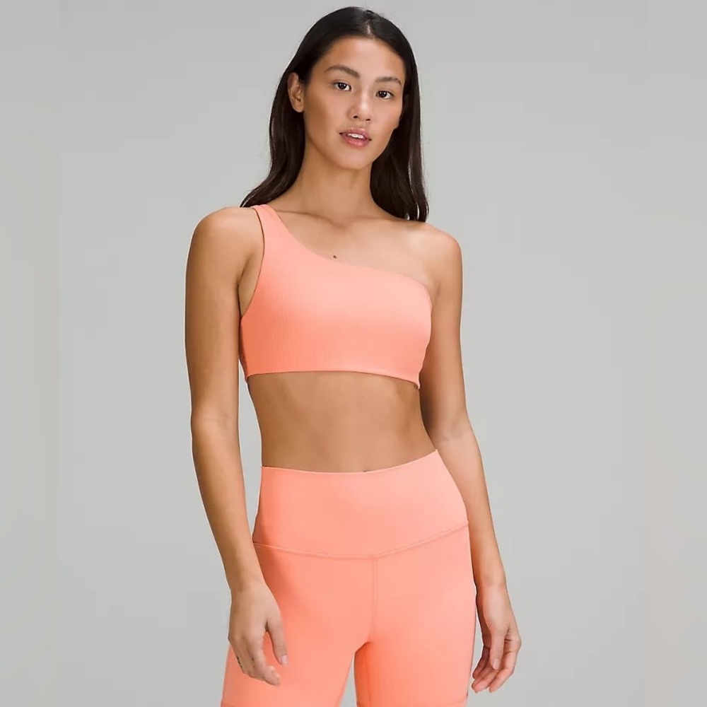 Lululemon Ribbed Nulu Asymmetrical Yoga Bra in Sunny Coral